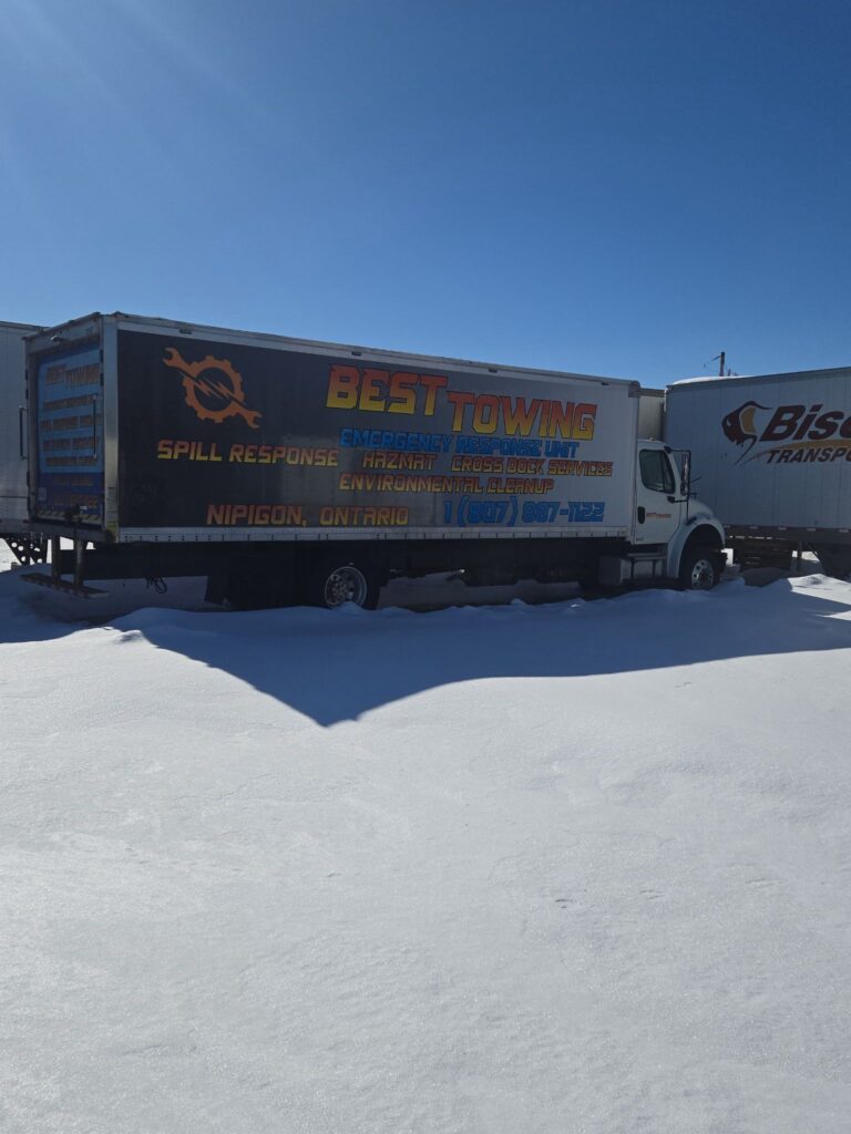 Best Towing emergency response truck parked in snow, Nipigon, Ontario.